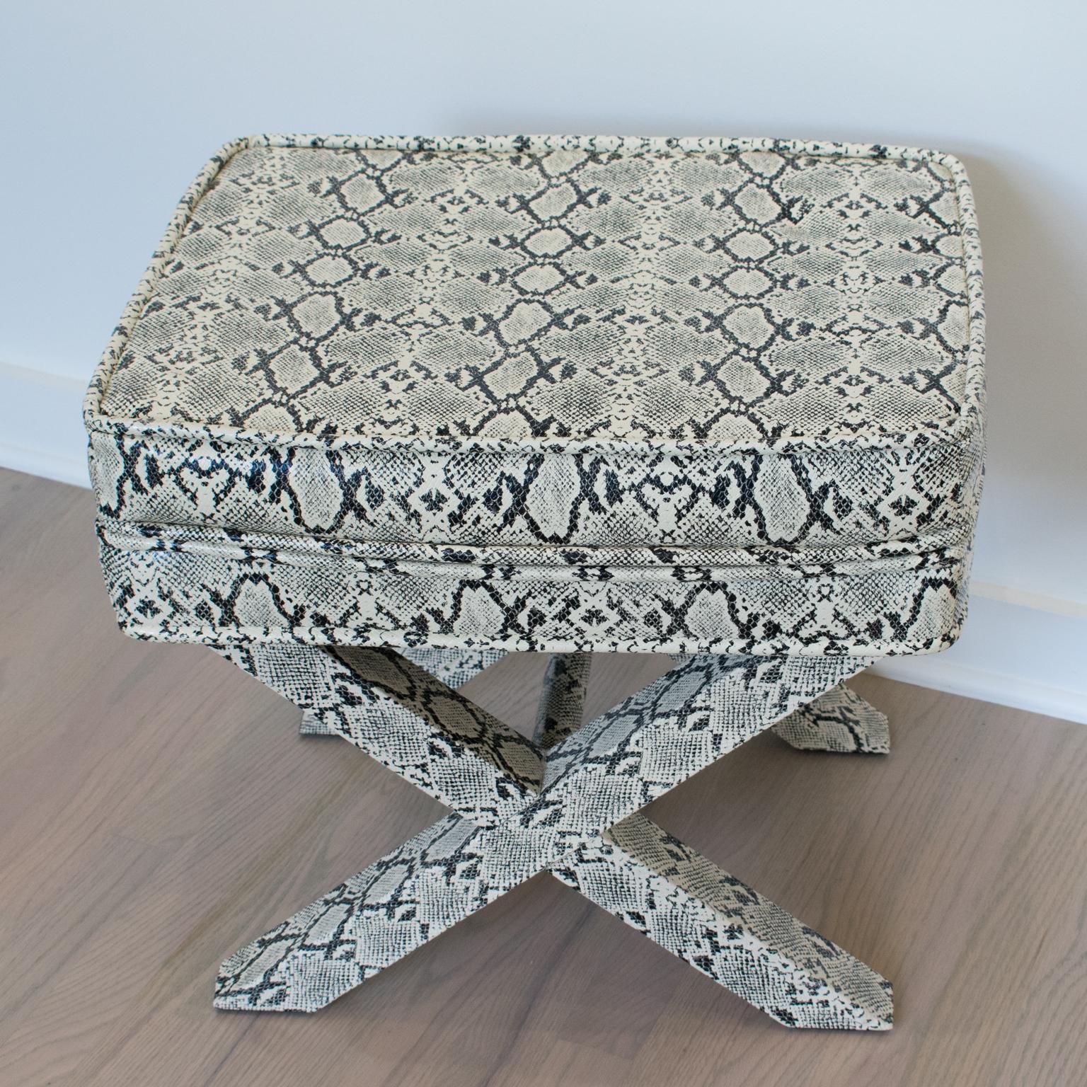 This lovely bench, ottoman, or footstool in faux python skin is crafted with fully upholstered designs reminiscent of Billy Baldwin and Karl Springer's work. The sleek urban design has a Classic 