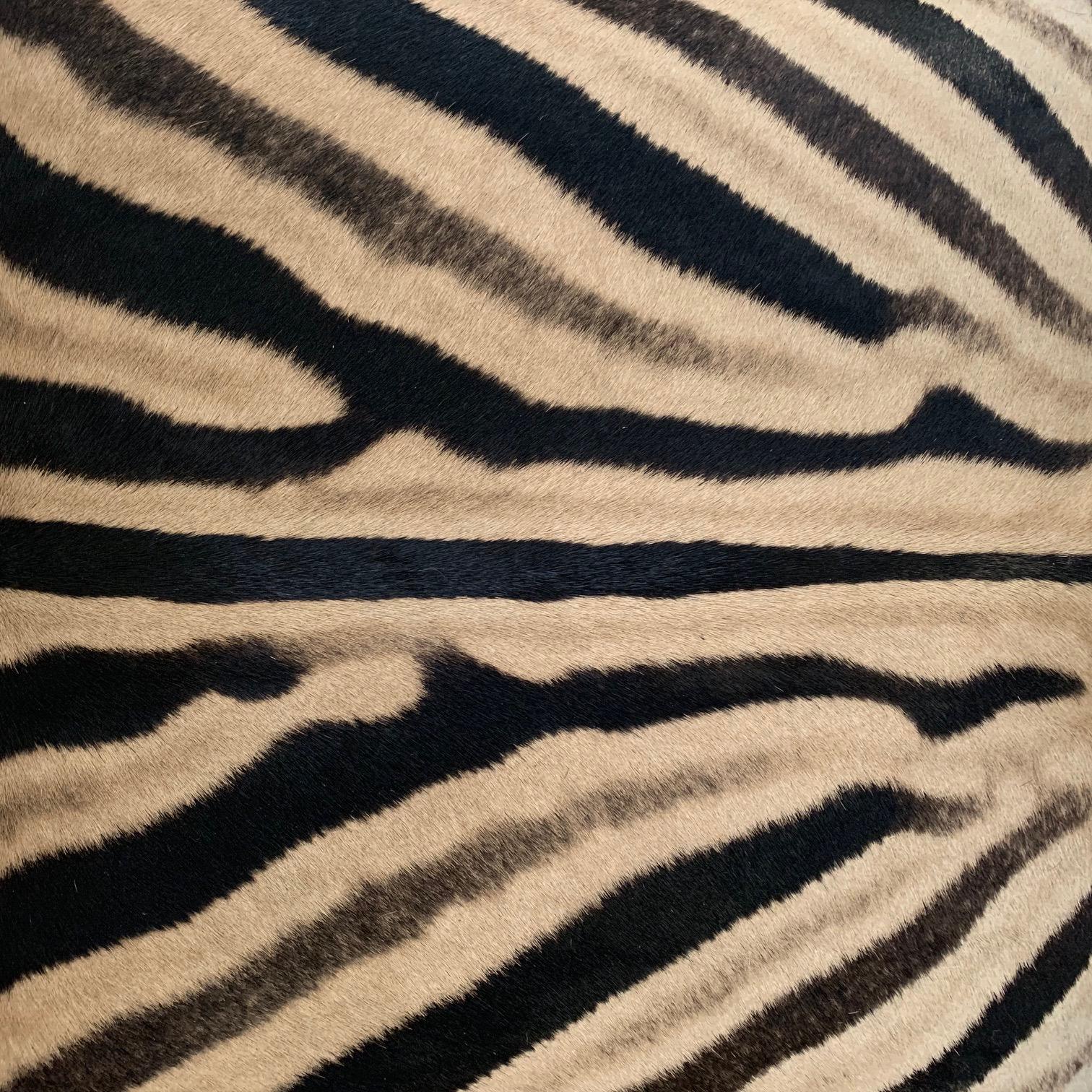 Stunning Billy Baldwin style X-Bench destined for an amazing room. This is glitter and gold and glamour! The work and craftsmanship to bring this bench back to life is incredible. The luxurious zebra hide is meticulously wrapped around each X-shaped