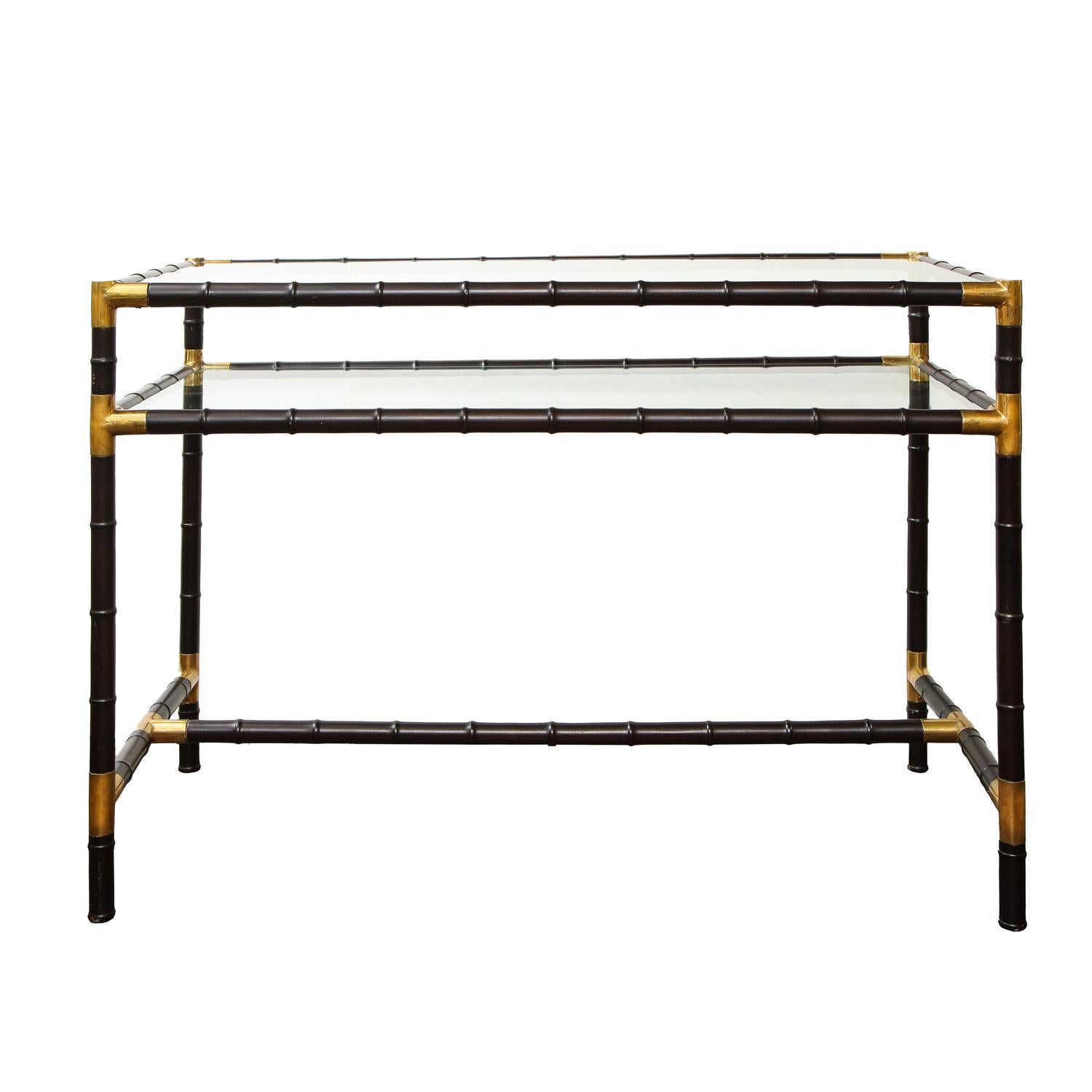 Rare and elegant faux bamboo table in steel and glass with brass accents by Billy Haines, American 1970.

The table has beautiful lines and an impressive understated aesthetic. The size, shape and scale make it a perfect console or entry table.