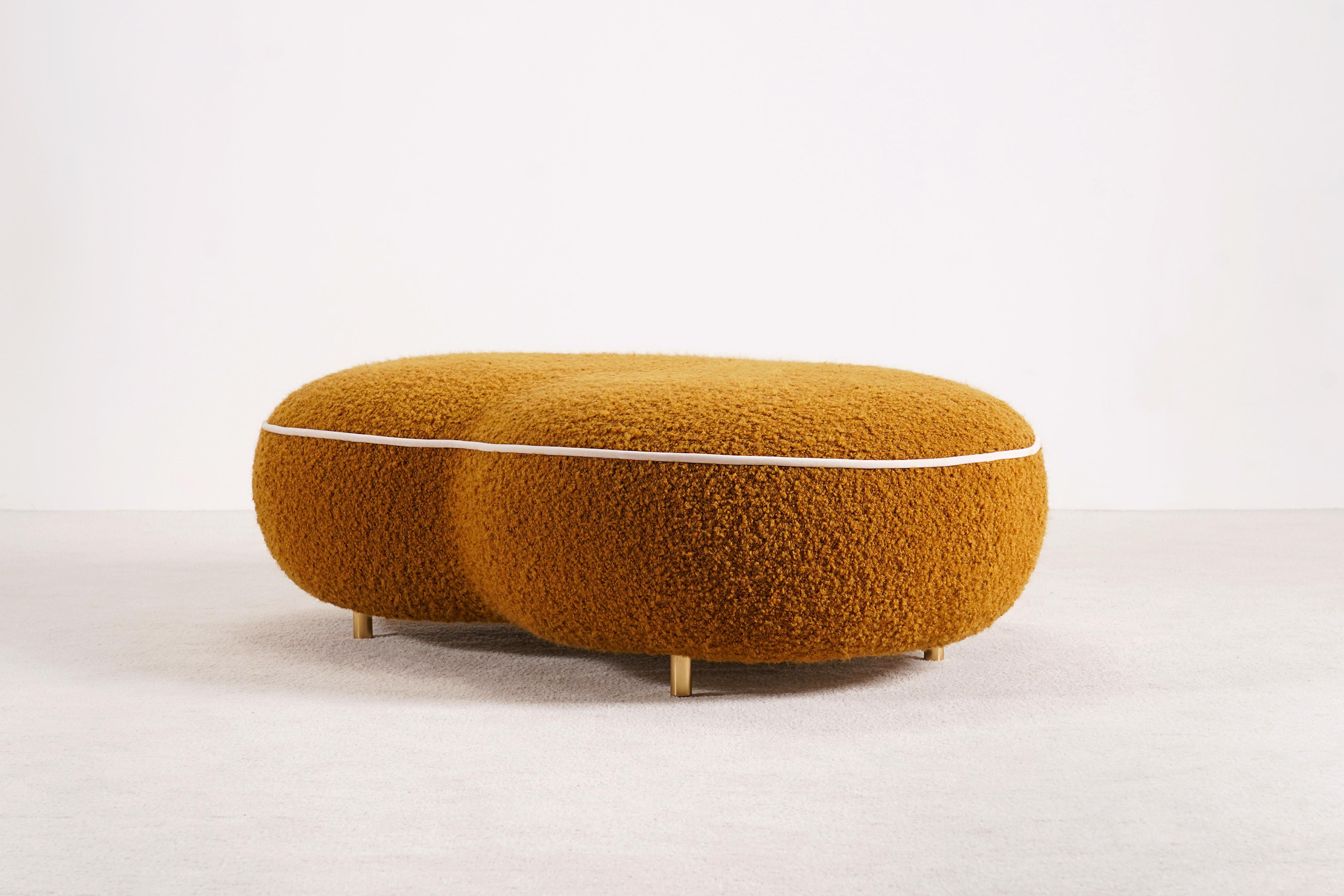 Billy Ottoman by Proisy Studio. 

Billy is an elegant and refined curved Ottoman or Pouf designed by Proisy Studio. This piece is a part of a collection named 