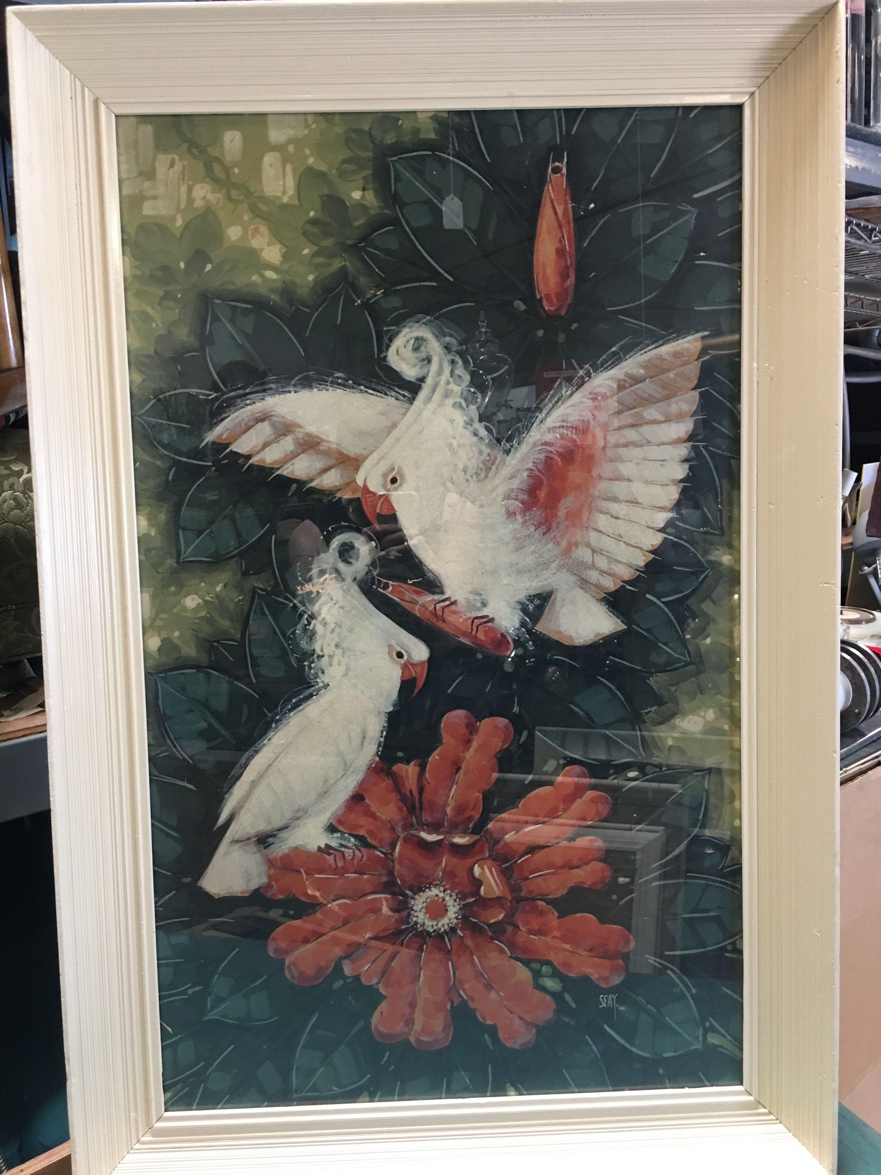 Billy Seay Airbrushed parrot lovers (original airbrushed over a print) for the Turner Company, circa 1948, in the original white painted frame. A great example of the post-WWII Hawaiian and tropical art/decorating boom. Great for vintage Art Deco