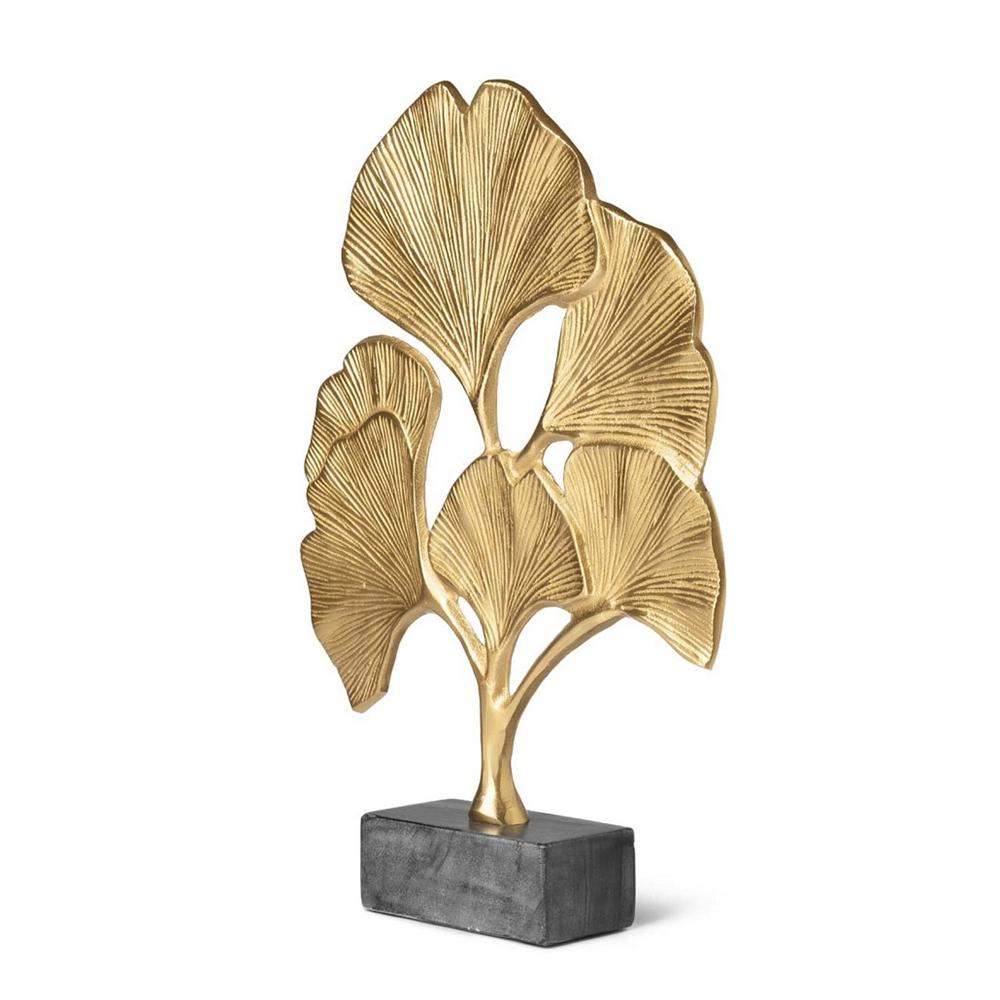 Escultura Biloba Mediana con estructura metálica
en acabado dorado y con base de mármol gris.