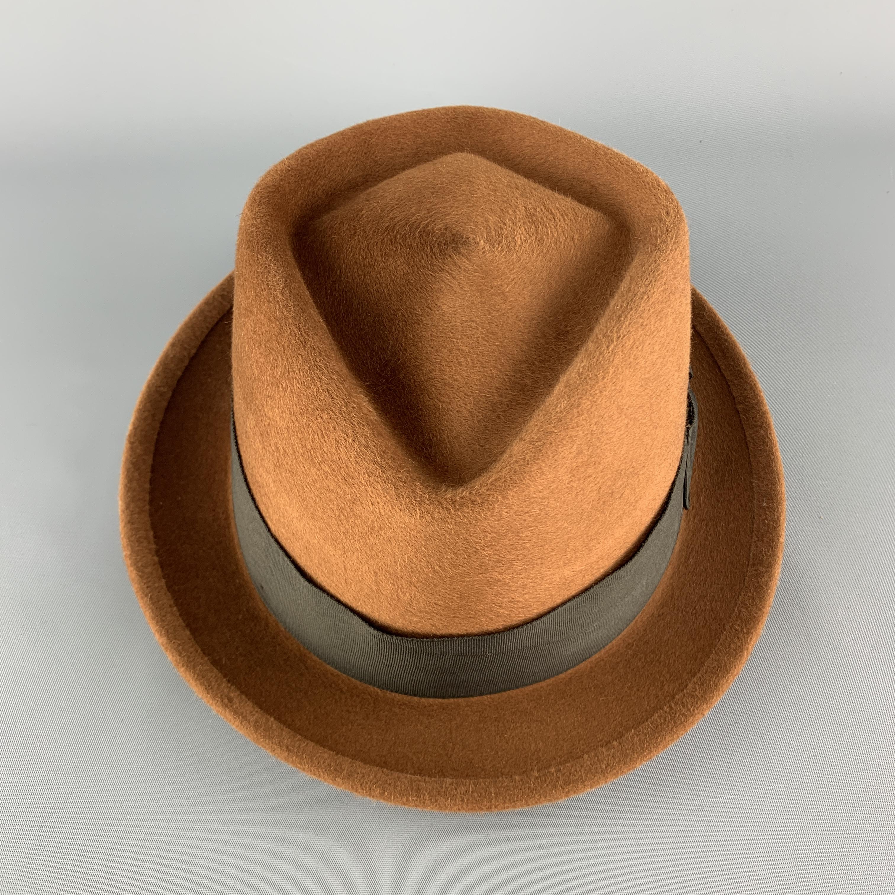 BILTMORE fedora comes in tan brushed felt with a diamond crown and black ribbon trim. Made in Canada.

Excellent Pre-Owned Condition.
Marked: 6 7/8  55

Measurements:

Opening: 22.5 in.
Brim: 1.25 in.
Height: 3.5 in.