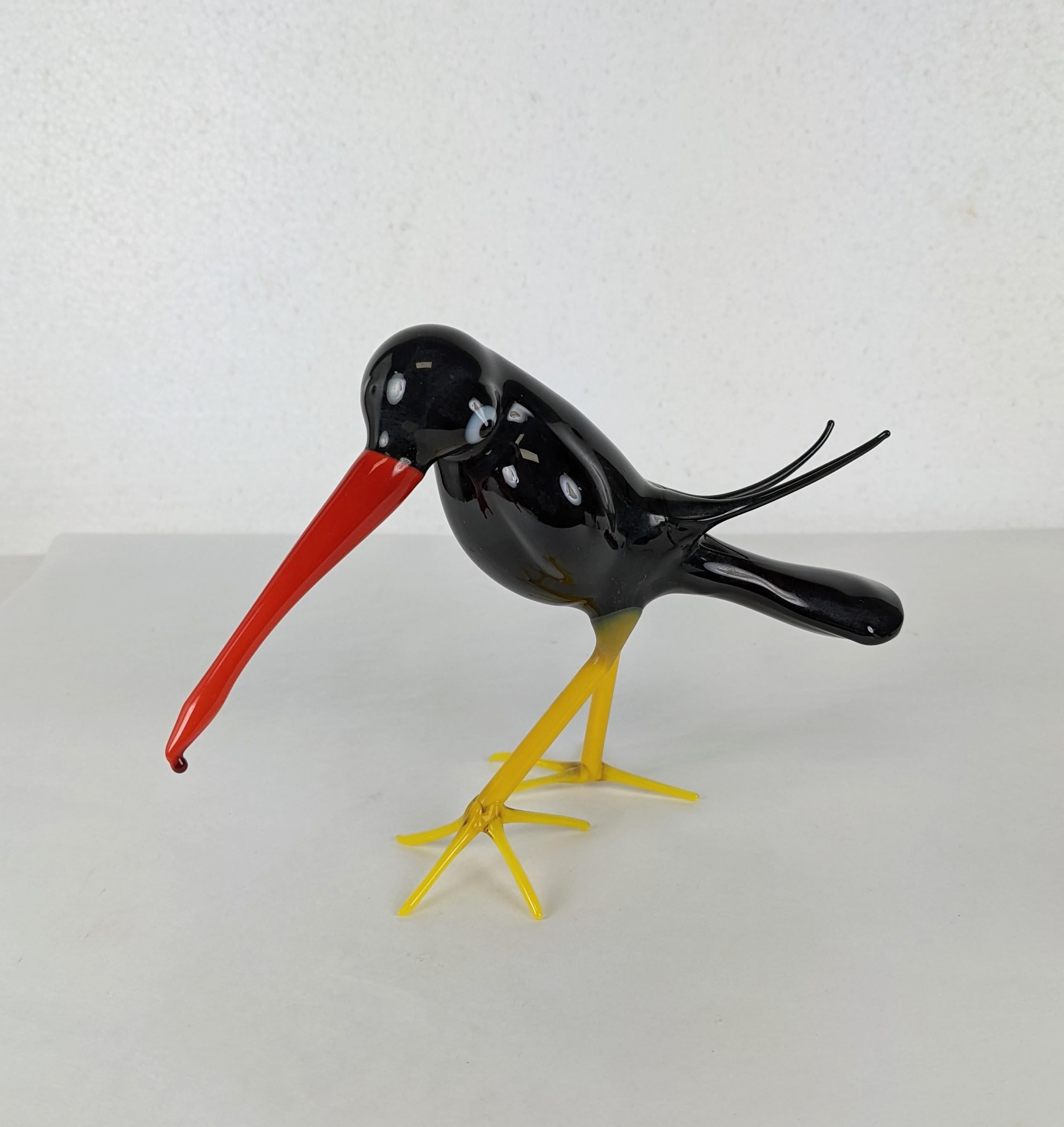 Bimini glass exotic cartoon bird from the Art Deco period, circa 1930's. With a Disneyesque look and striking stance. Delicate hollow blown construction in vibrant colorations. Excellent condition. 
Austria circa 1930's. 7