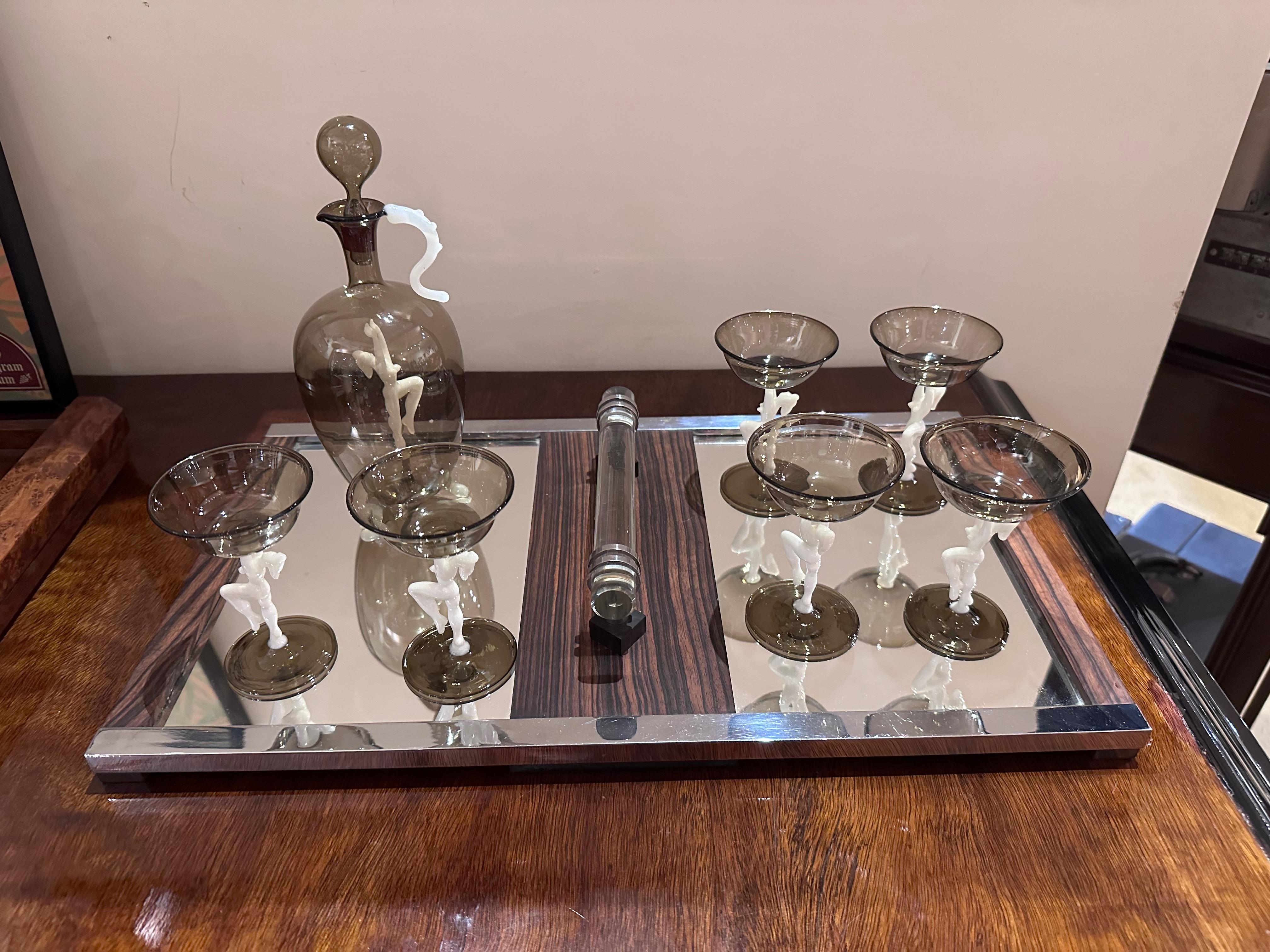 Bimini (Vienna) Complete Liqueur Set – Original Decanter and 6 Matching Glasses featuring Dancer/Nude Figures, Rare Find. This set is crafted from walled brown and opaque white hand-blown glass. The carafe includes a white inner figure and the