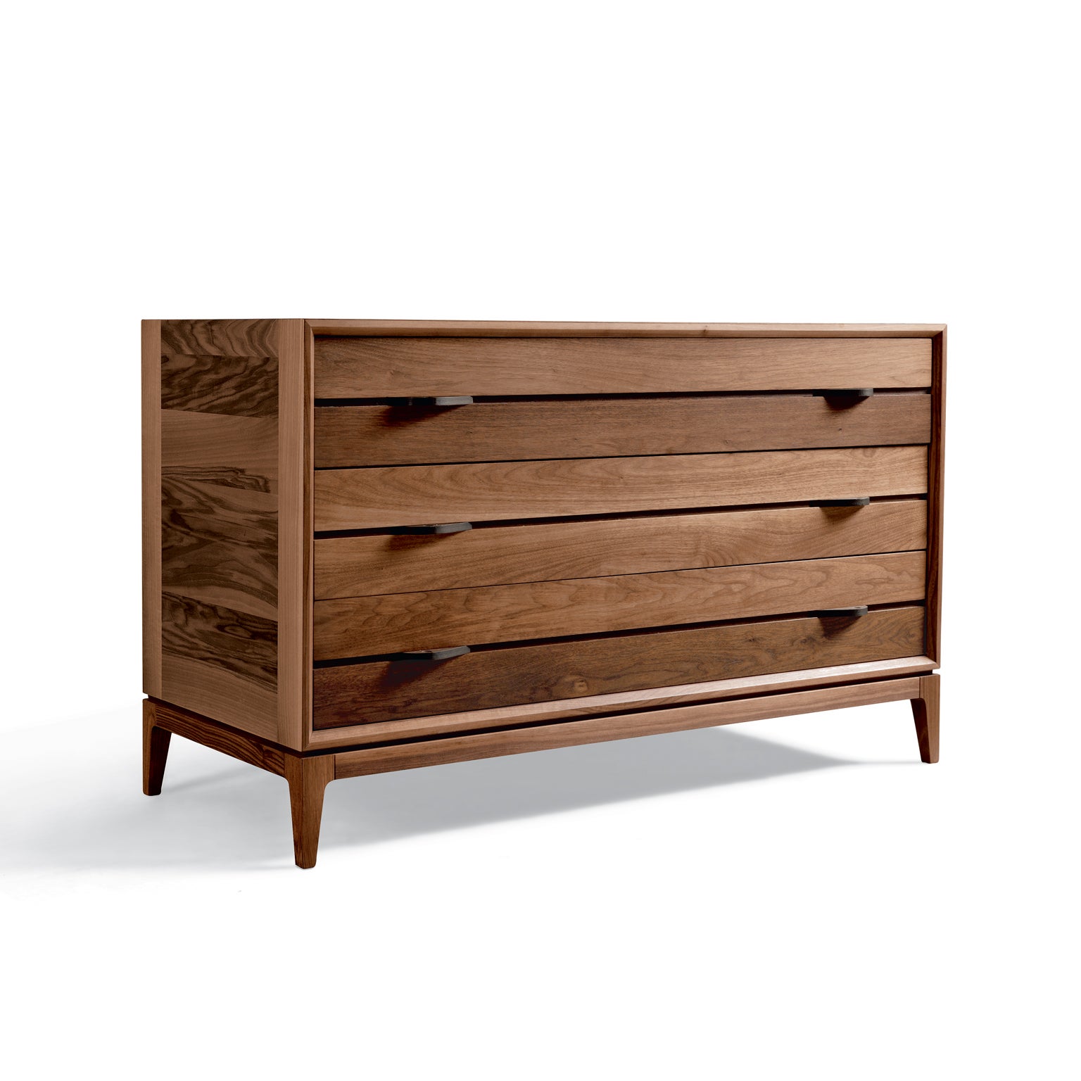 Made in Italy craftmanship shines through the Liliale solid wood dresser. With blockboard structure and slightly inclined drawers, it is made by expert hands from high quality solid walnut with acrylic finish. A modern yet classic design that will