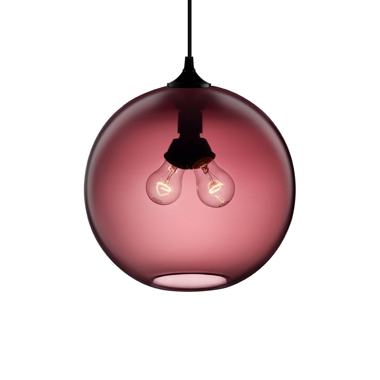 The allure of the Binary pendant is the presence of two bulbs at the pendant’s center, radiating rich, ambient light. Every single glass pendant light that comes from Niche is handblown by real human beings in a state-of-the-art studio located in