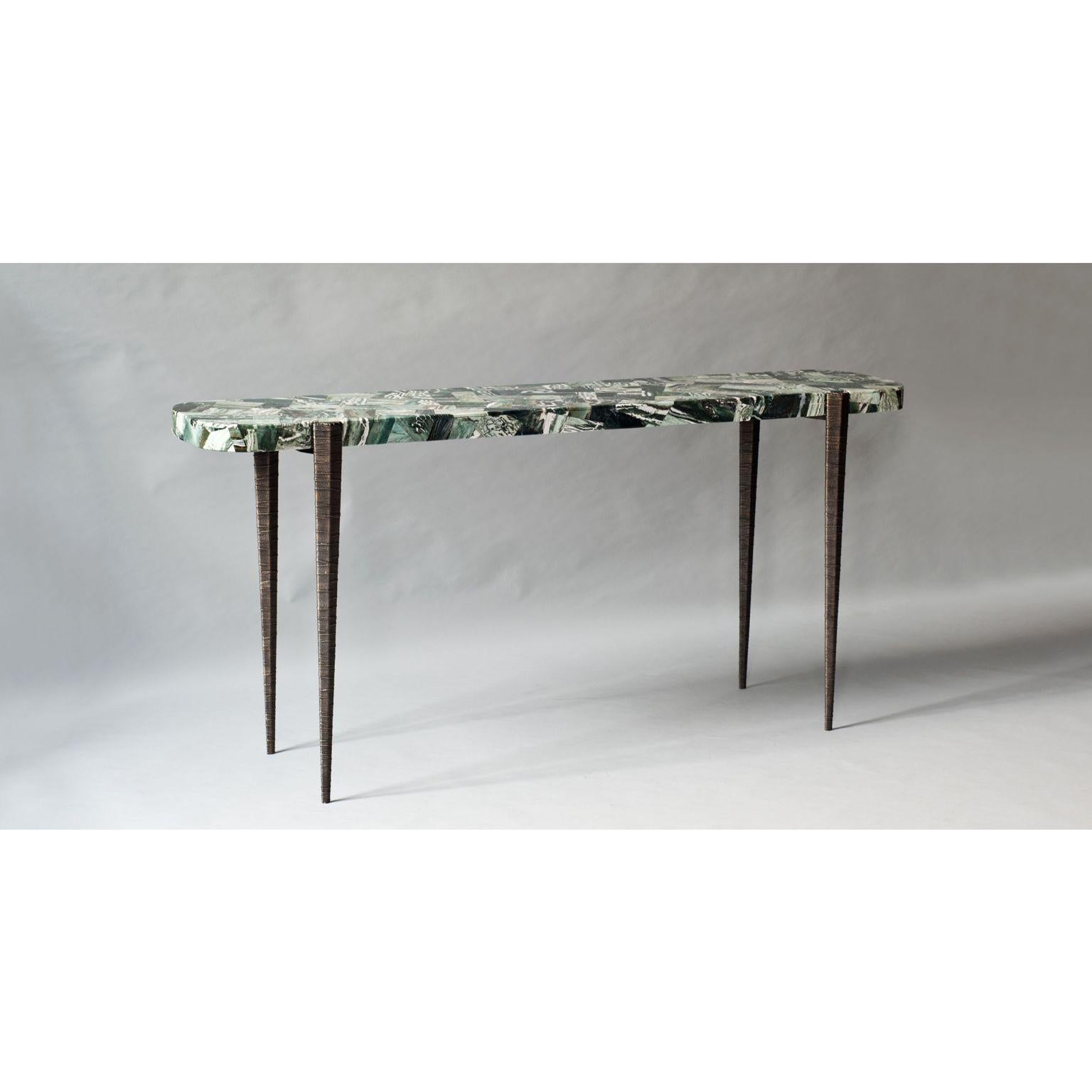 Bind console by DeMuro Das 
Dimensions: W 165 x D 37.6 x H 76 cm
Materials: Agate (Green Zebra), polished (Random)
 Solid bronze (Antique) legs

Dimensions and finishes can be customized.

DeMuro Das is an international design firm and the