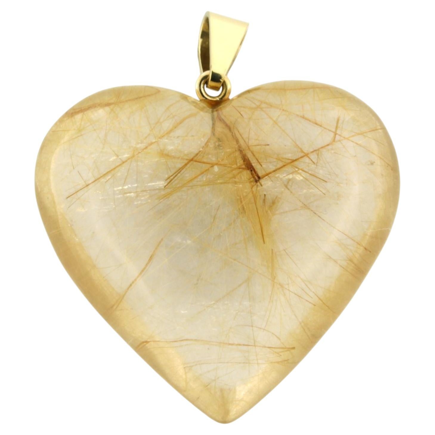 BINDER 18k gold heart-shaped pendant of rock crystal with rutile inclusions