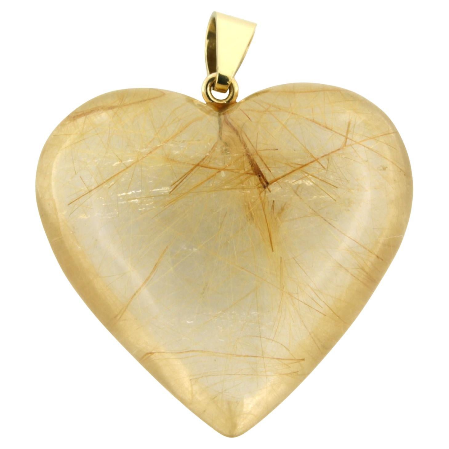 BINDER - Ciondolo in oro 18k a forma di cuore in cristallo di rocca con rutiel