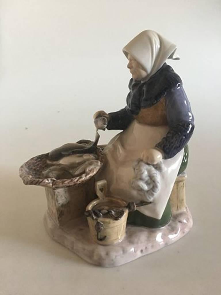 Bing & Grondahl figurine fisherwoman #2233. Measures 20 cm and is in perfect condition.