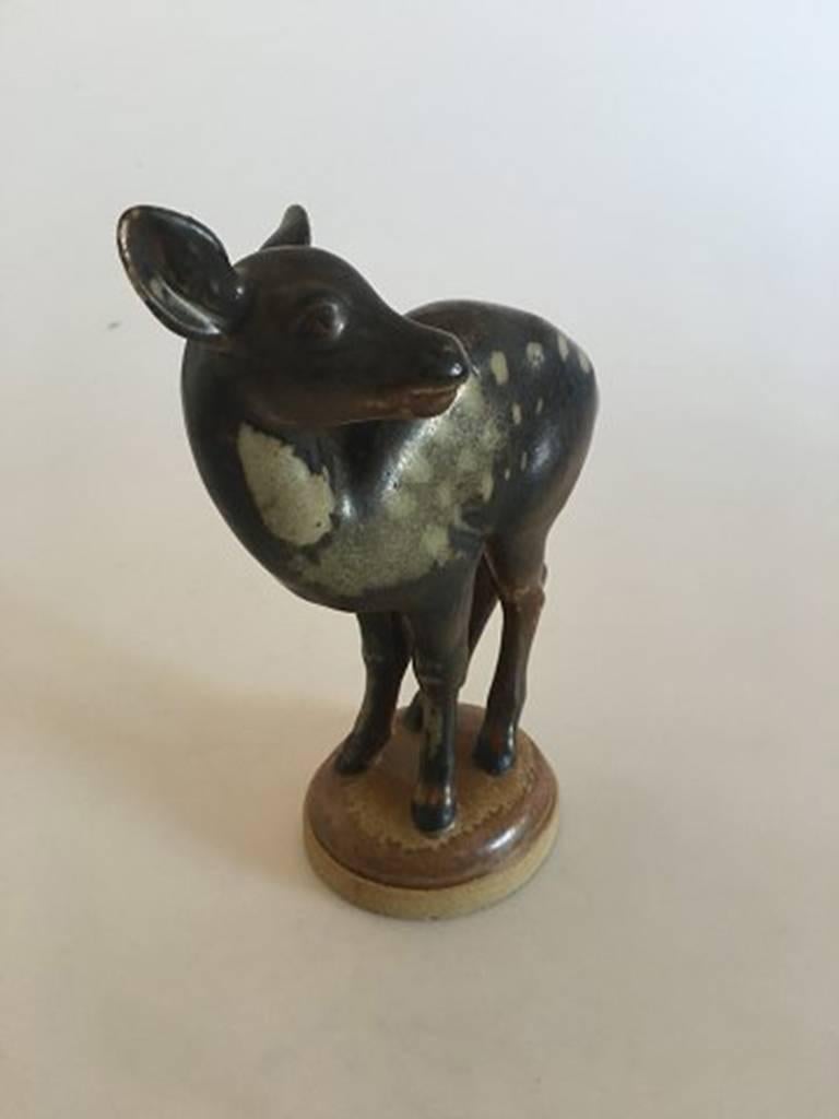 Bing & Grondahl figurine of deer on base #1929.
Measures 18 cm / 7 1/10 inches.