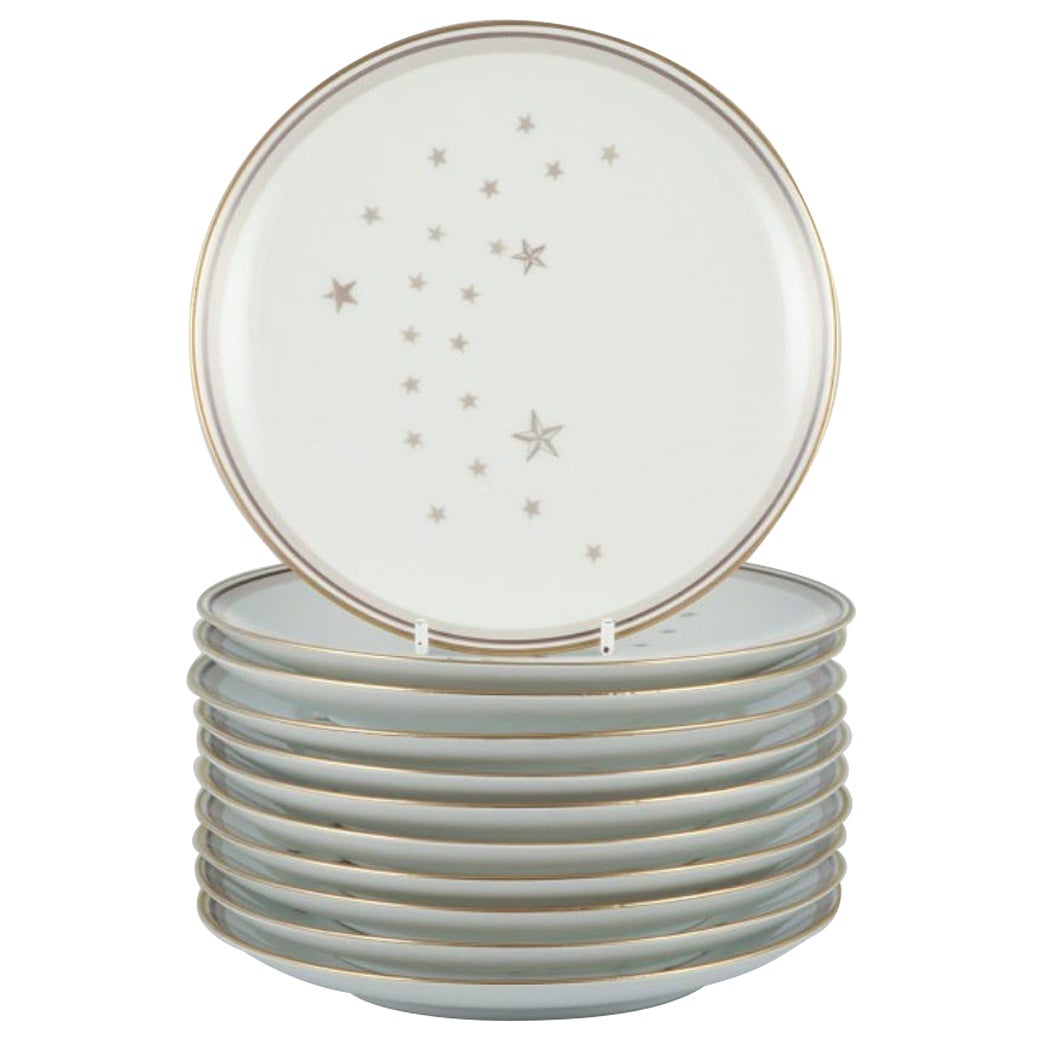 Bing et Grondahl, Milky Way". Ensemble de onze assiettes décorées d'or