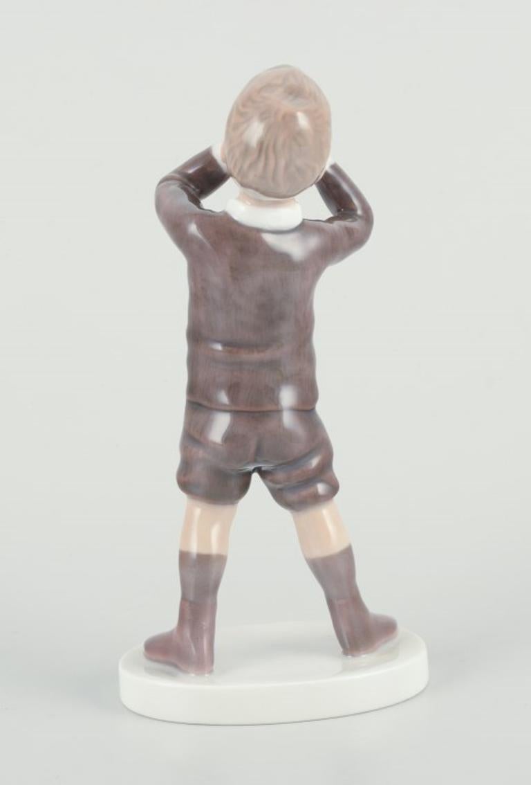 Bing e Grondahl, statuetta in porcellana di ragazzo con Horn. 1920s in vendita 1