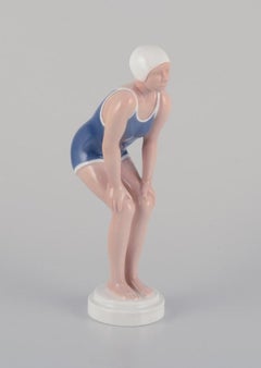 Bing and Grondahl, porcelain figurine of girl in swimsuit. Rare Art Deco figure.
