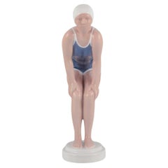 Bing and Grondahl, porcelain figurine of girl in swimsuit. Rare Art Deco figure.
