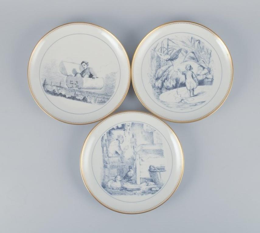 Bing & Grøndahl, a set of eleven porcelain plates with H. C. Andersen motifs. In Excellent Condition For Sale In Copenhagen, DK