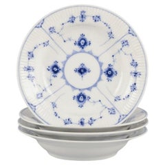 Bing & Grøndahl Blue Fluted.  Set of four antique deep plates in porcelain.