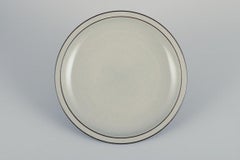 Bing & Grøndahl Kolumbien. Satz von acht Tellern aus Steingut. Aus den 1970er Jahren.