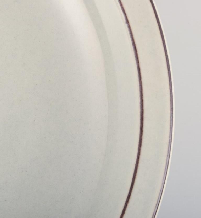 Danois Bing & Grøndahl Colombie. Ensemble de sept assiettes profondes en grès. en vente