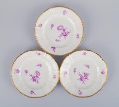 Bing & Grøndahl, Denmark. A set of twelve small plates with flower decorations