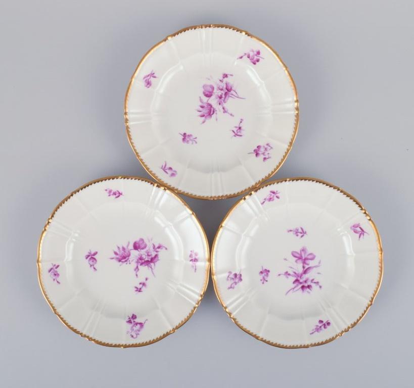 Danish Bing & Grøndahl, Denmark. A set of twelve small plates with flower decorations For Sale