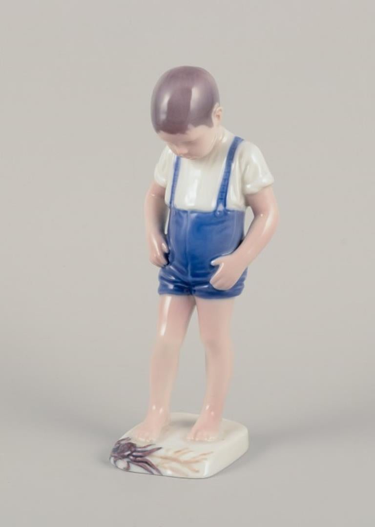 Bing & Grøndahl, Denmark.
Porcelain figurine of a boy and crab.
Model number 1870.
Mid-20th century.
Marked.
In perfect condition.
First factory quality.
Dimensions: H 20.0 cm x W 7.2 cm.