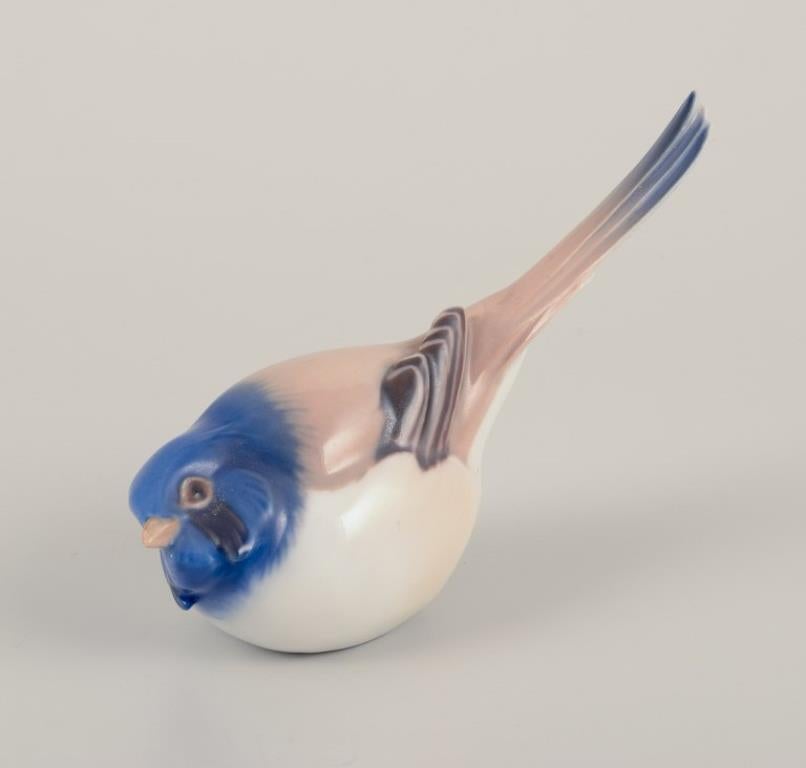 Bing & Grøndahl, Denmark.
Two porcelain figurines of birds.
