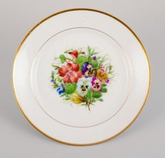 Bing & Grøndahl, five porcelain lunch plates hand-painted with flowers