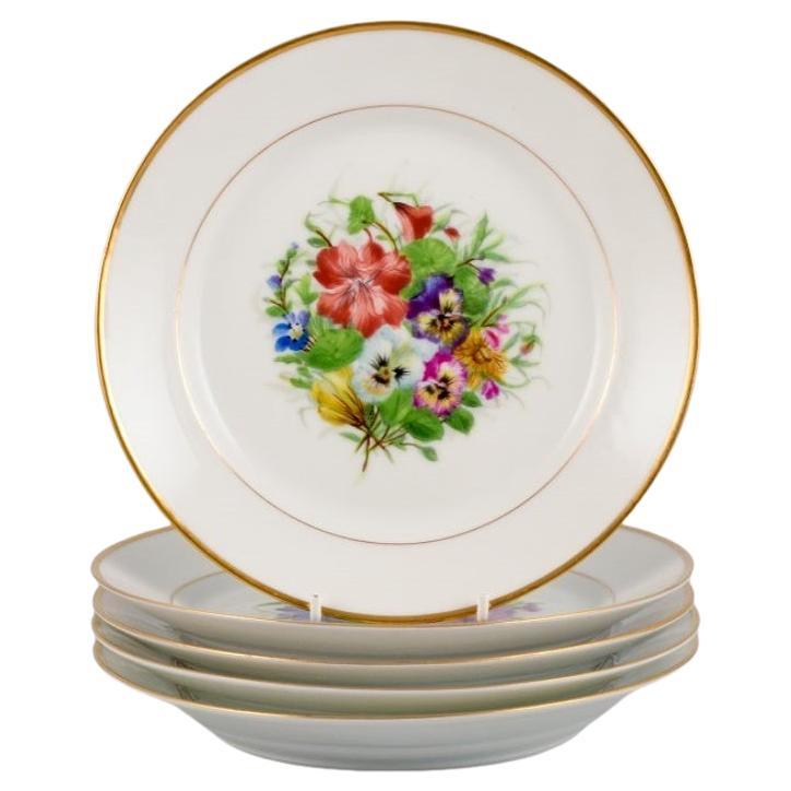 Bing & Grøndahl, five porcelain lunch plates hand-painted with flowers For Sale