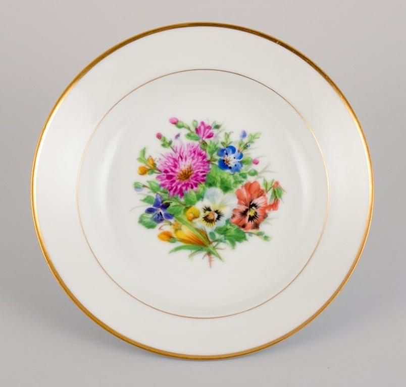Hand-Painted Bing & Grøndahl, four deep plates in porcelain hand-painted with flowers For Sale