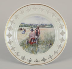 Bing & Grøndahl. Quattro piatti in porcellana con motivi tratti dai dipinti di Carl Larsson.