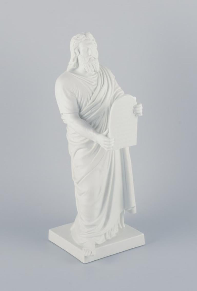 Bing & Grøndahl, large and impressive biscuit sculpture depicting Moses with the stone tablets. 
After Bertel Thorvaldsen.
Late 19th century.
Marked.
In excellent condition with minimal and insignificant chip on the base.
Dimensions: H 42.5 cm x D