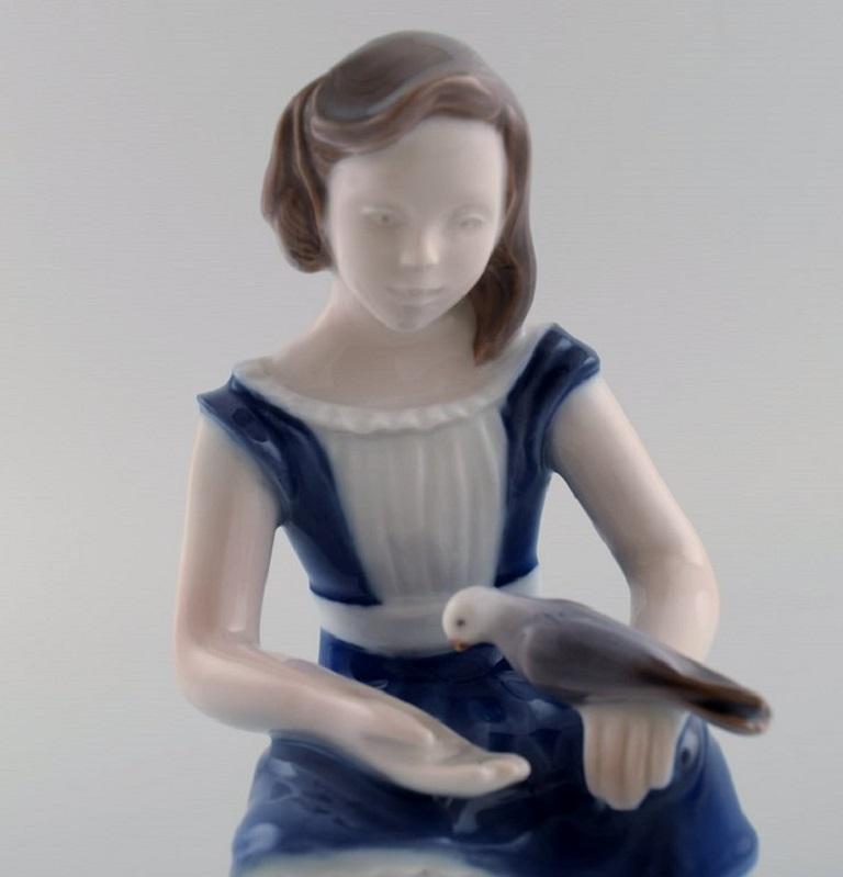 20th Century Bing & Grøndahl Porcelain Figure, Girl with Dove, Model Number 2340 For Sale