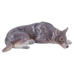 Bing & Grøndahl porcelain figurine of a reclining German Shepherd. 