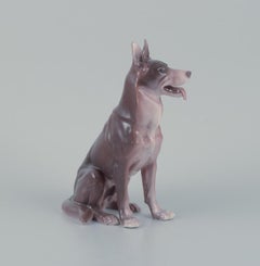 Bing & Grøndahl, porcelain figurine of a sitting German Shepherd.