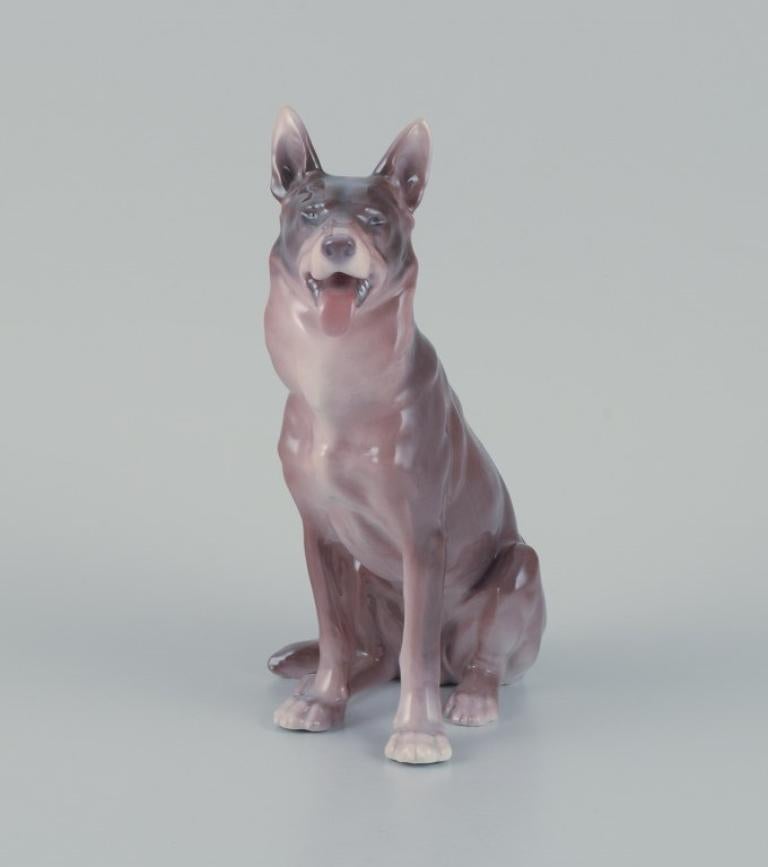 Danish Bing & Grøndahl, porcelain figurine of a sitting German Shepherd. For Sale