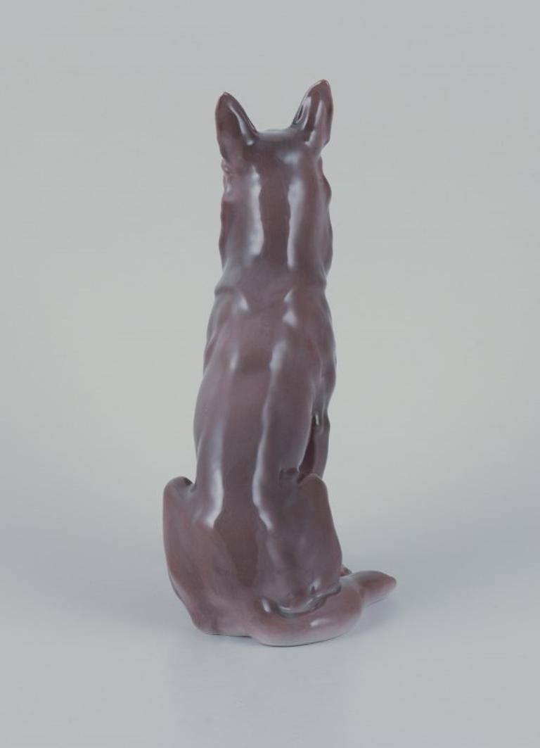 Late 20th Century Bing & Grøndahl, porcelain figurine of a sitting German Shepherd. For Sale