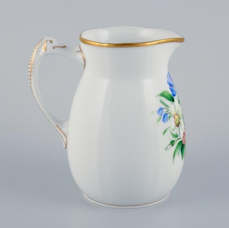 Danish Bing & Grøndahl, porcelain jug decorated with polychrome flowers. For Sale
