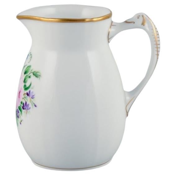 Bing & Grøndahl, porcelain jug decorated with polychrome flowers. For Sale