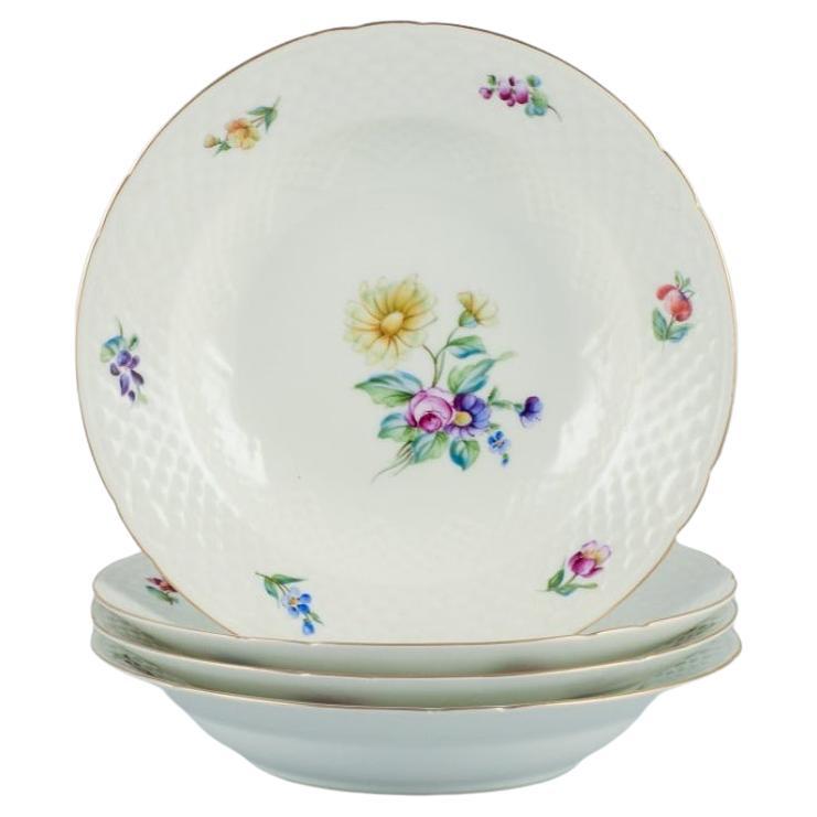 Bing & Grøndahl, Saxon Flower, set of four deep plates in porcelain, ca 1930s For Sale