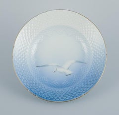 Bing & Grøndahl Seagull, six deep plates with seagull and gold decoration.