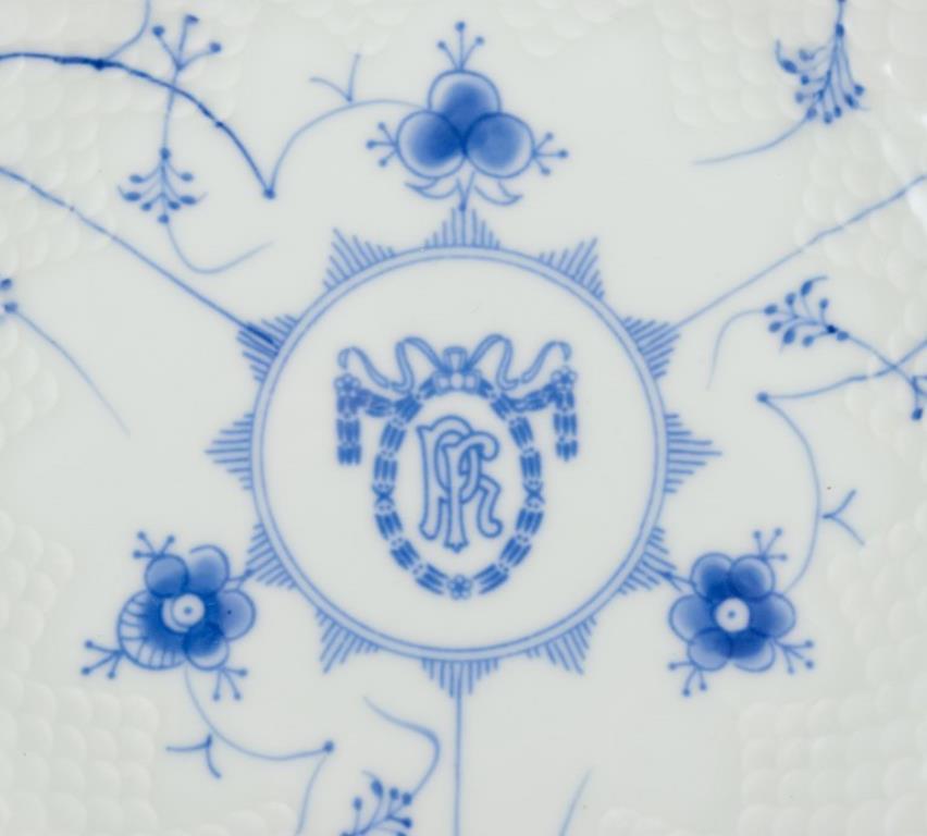 Porcelain Bing & Grøndahl. Set of four Blue Fluted plates. Hotel/restaurant porcelain.