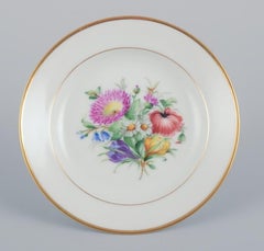 Bing & Grøndahl, set of four small plates hand-painted with polychrome flowers