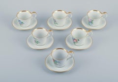 Bing & Grøndahl. Set of six antique coffee cups with high handles and saucers.
