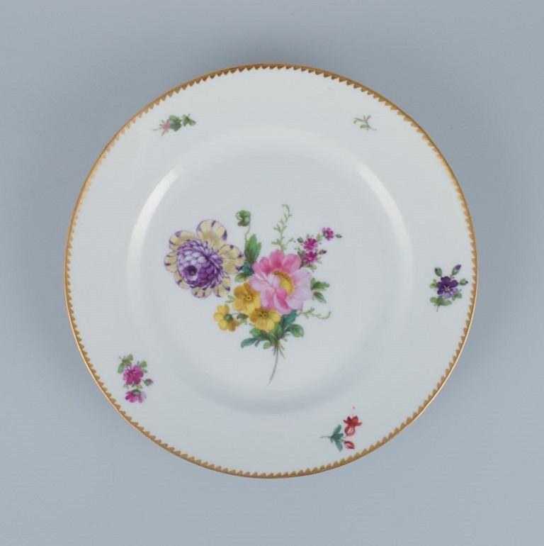 Danish Bing & Grøndahl, six Saxon Flower dinner plates in porcelain