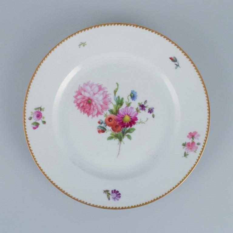 Early 20th Century Bing & Grøndahl, six Saxon Flower dinner plates in porcelain