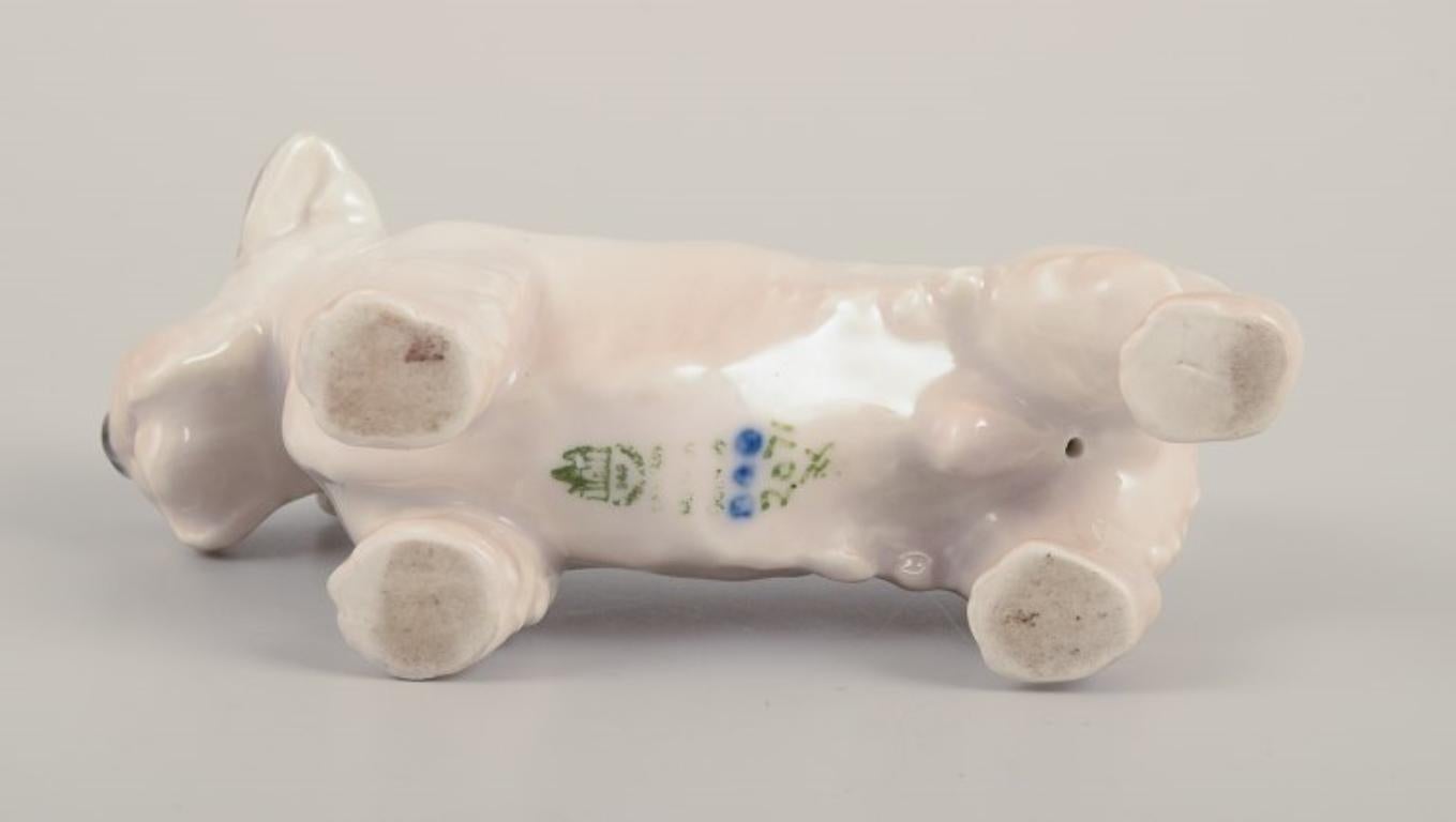 Mid-20th Century Bing & Grøndahl, small porcelain figurine of a Sealyham Terrier. For Sale