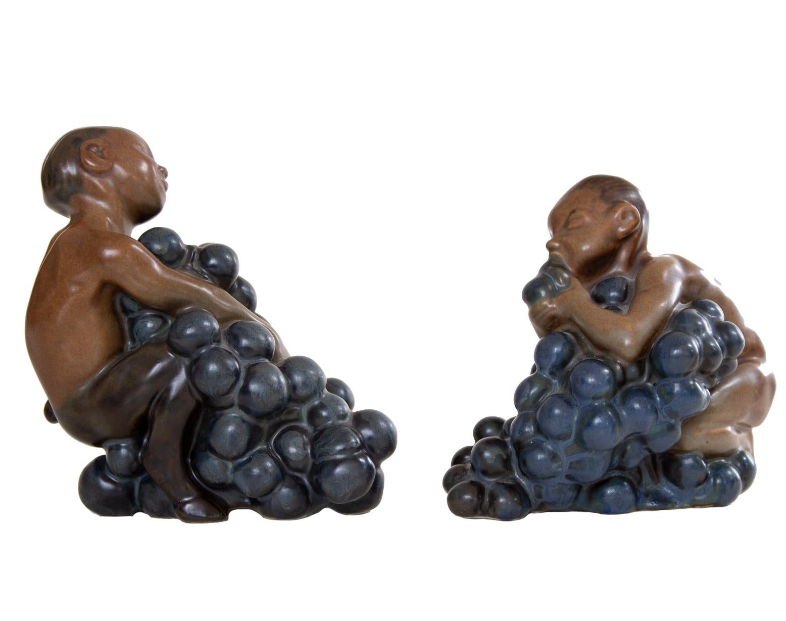 Danish Bing & Grøndahl, Stoneware Figurines, Bacchus and Boy with Grapes by Kai Nielsen For Sale