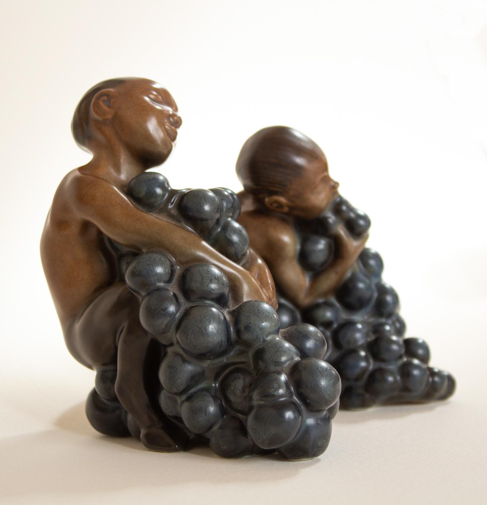 Molded Bing & Grøndahl, Stoneware Figurines, Bacchus and Boy with Grapes by Kai Nielsen For Sale